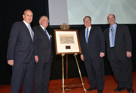 Regional Plan Association presents Howard Milstein with original artwork from the first RPA planning document. Taking part in the presentation are Elliot Sander (Chairman, RPA; President and CEO, HAKS Group, Inc.), John Zuccotti (Chairman, U.S. Commercial Operations, Brookfield Office Properties Co.; Member, RPA Board), Howard Milstein, and Robert Yaro (President, RPA) (left to right).