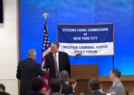 Howard Milstein introduces New York Police Commissioner William Bratton at the Milstein Criminal Justice Policy Forum on February 7, 2014.